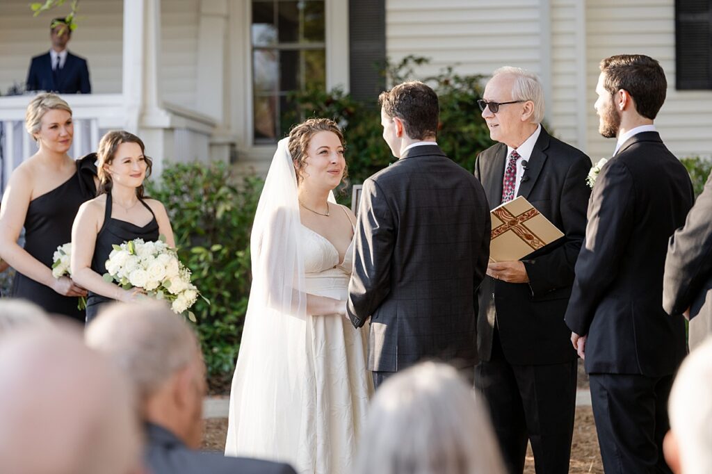 Outdoor wedding ceremony at Payne-Corley House front lawn